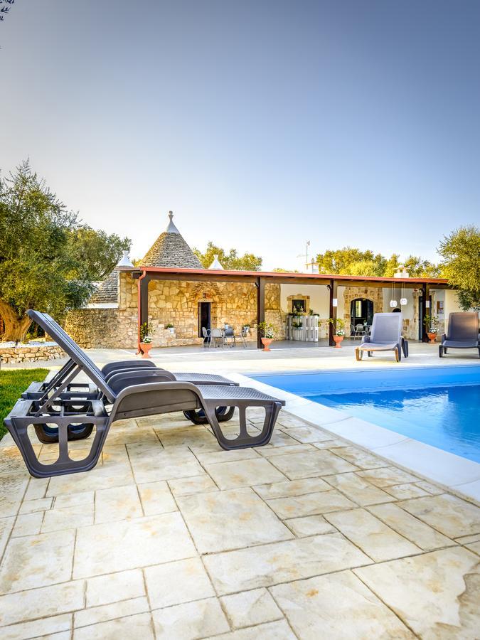 Trullo Degli Augelli Guest House San Michele Salentino Bagian luar foto