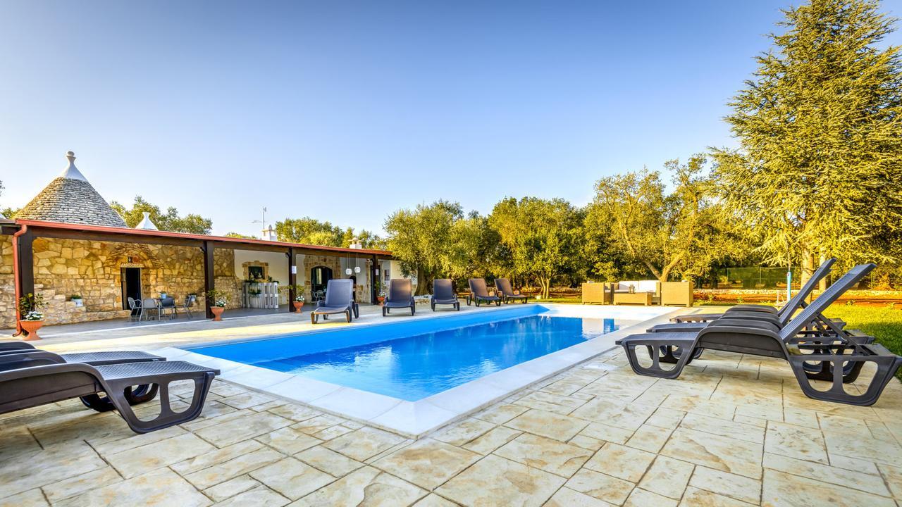 Trullo Degli Augelli Guest House San Michele Salentino Bagian luar foto