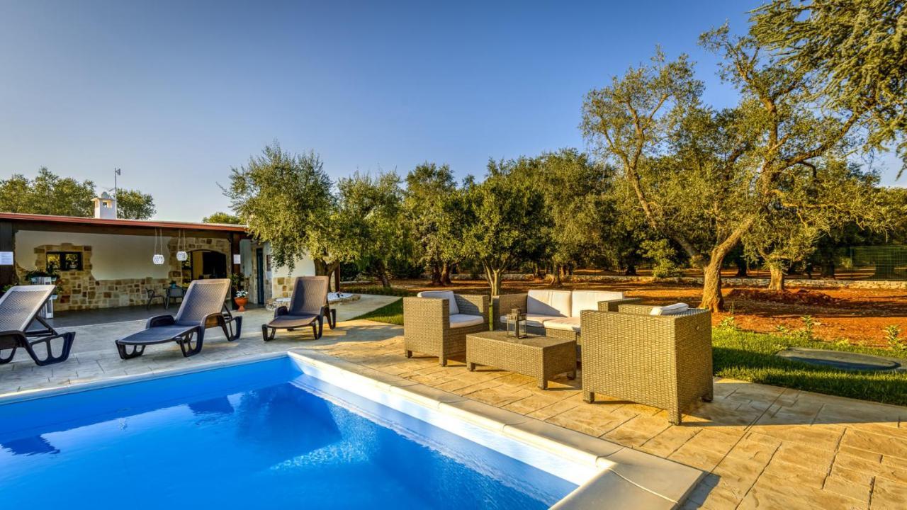 Trullo Degli Augelli Guest House San Michele Salentino Bagian luar foto