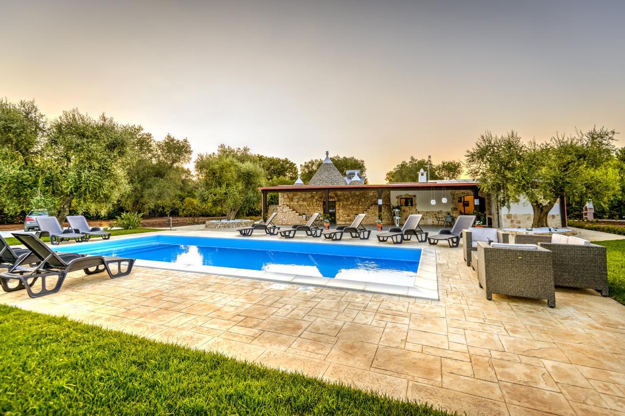 Trullo Degli Augelli Guest House San Michele Salentino Bagian luar foto